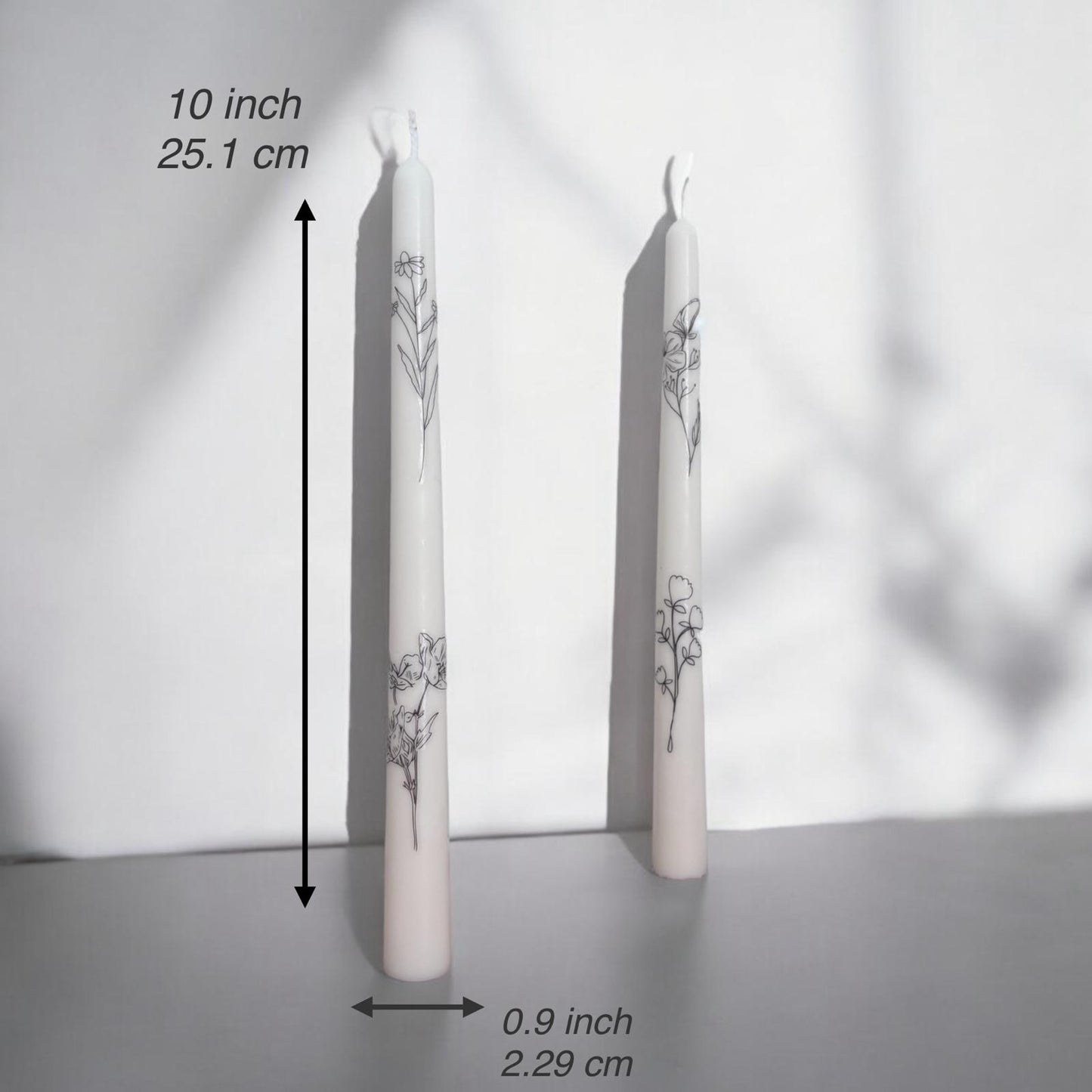 Set of 2 Taper Candles with Flowers.