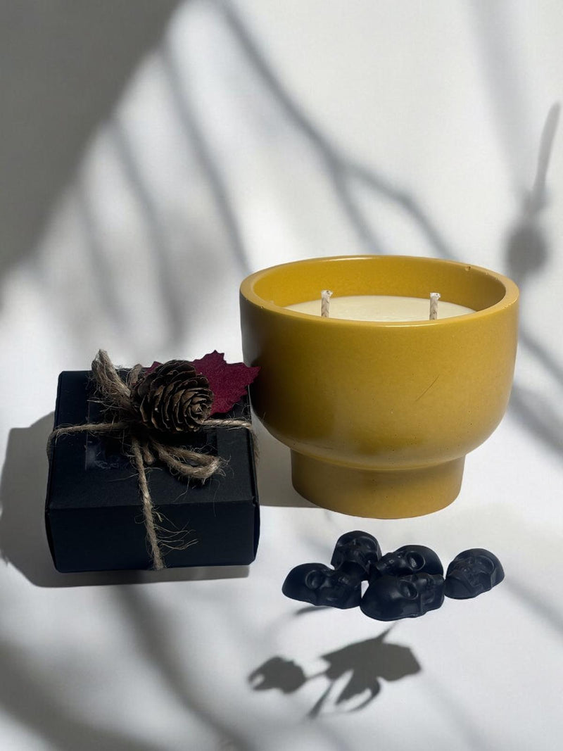 Yellow Candle Bowl, Black Skull Heads.