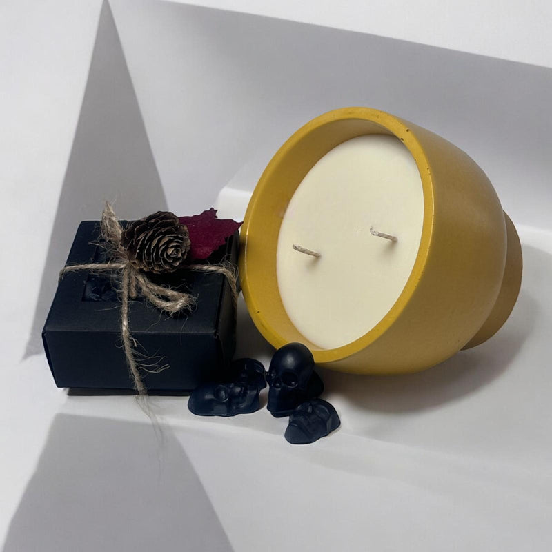 Yellow Candle Bowl, Black Skull Heads.