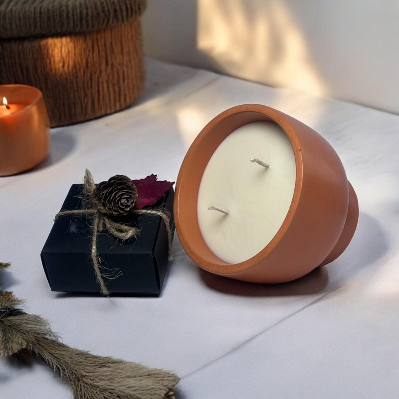 Orange Candle Bowl, Black Skull Heads.