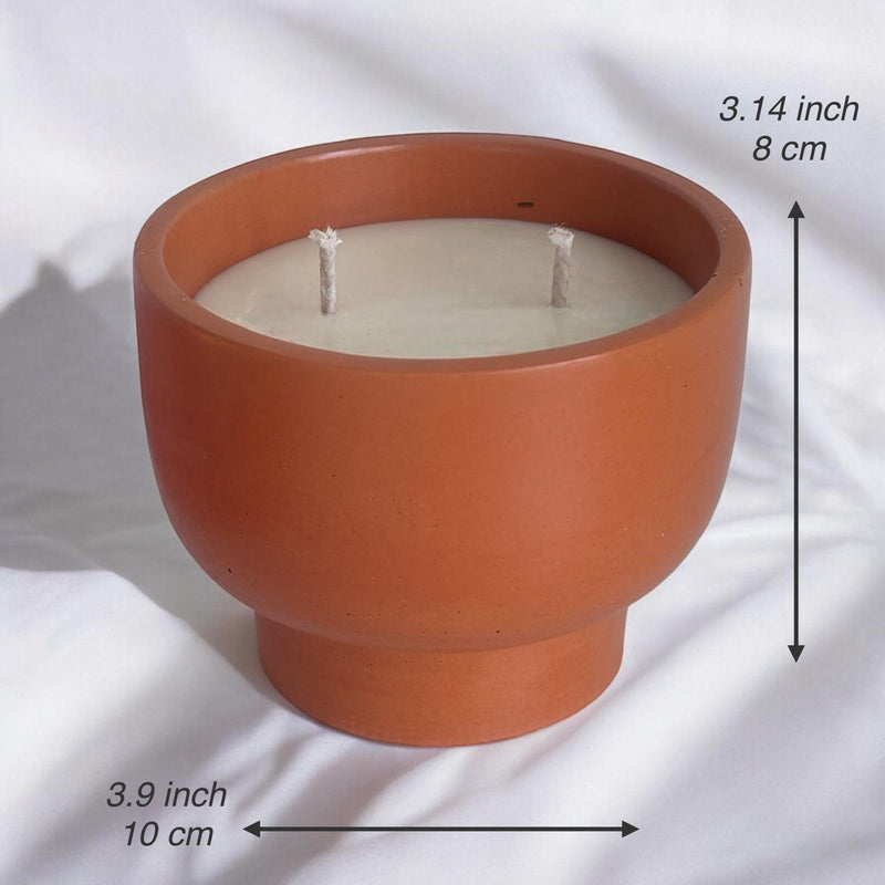 Orange Candle Bowl, Black Skull Heads.